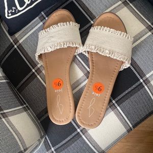 New sandals, never worn! Tag removed so can’t return. Just too small for me!